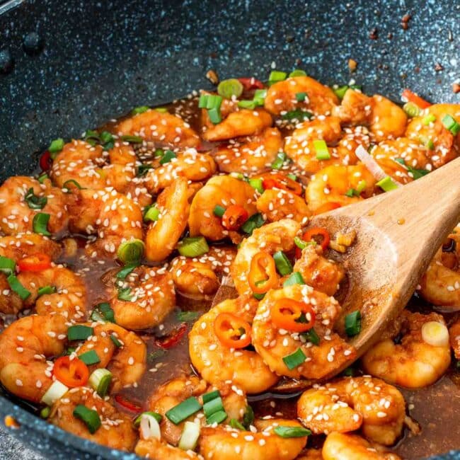 asian garlic shrimp in a wok.