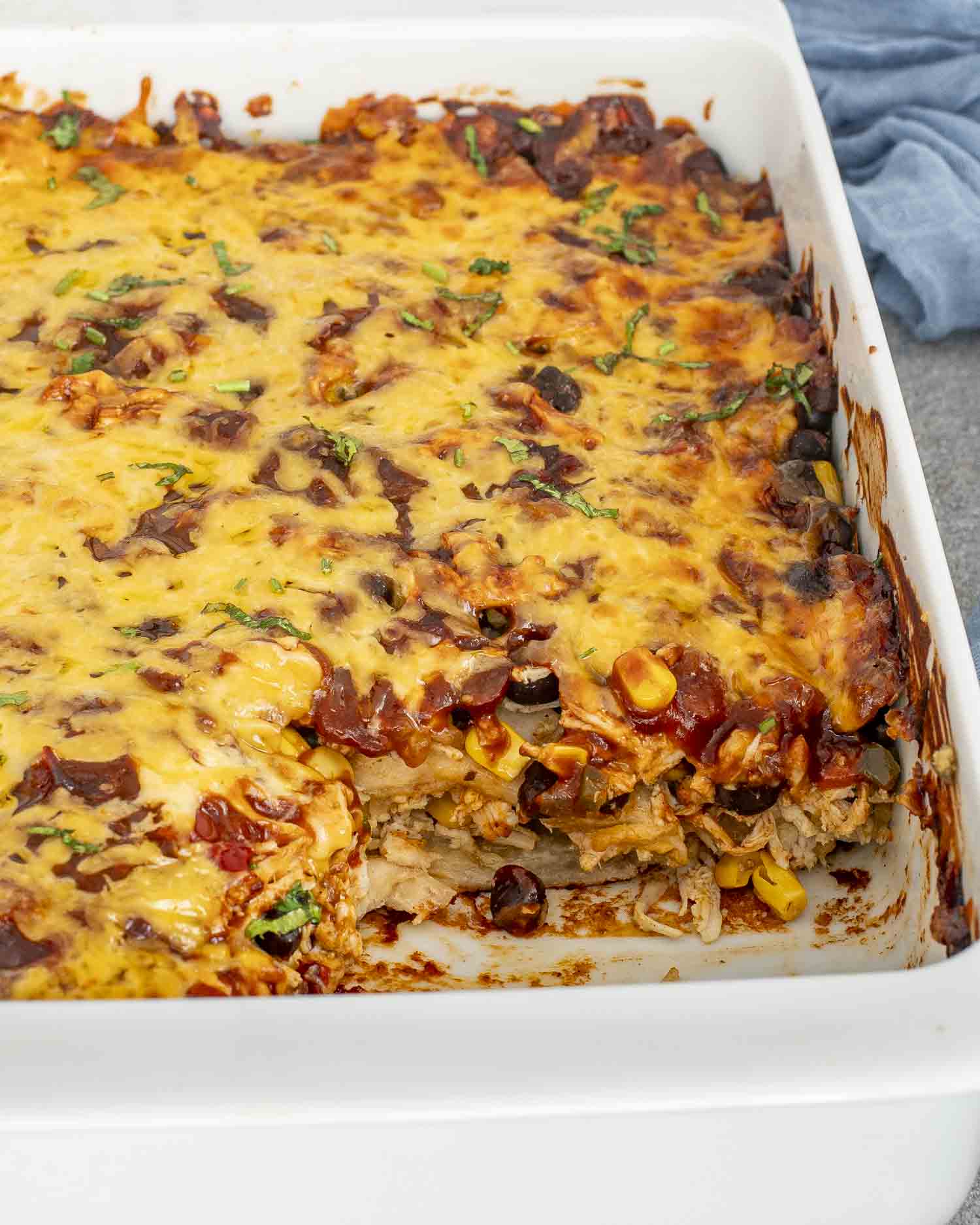 chicken enchilada casserole in a casserole dish.