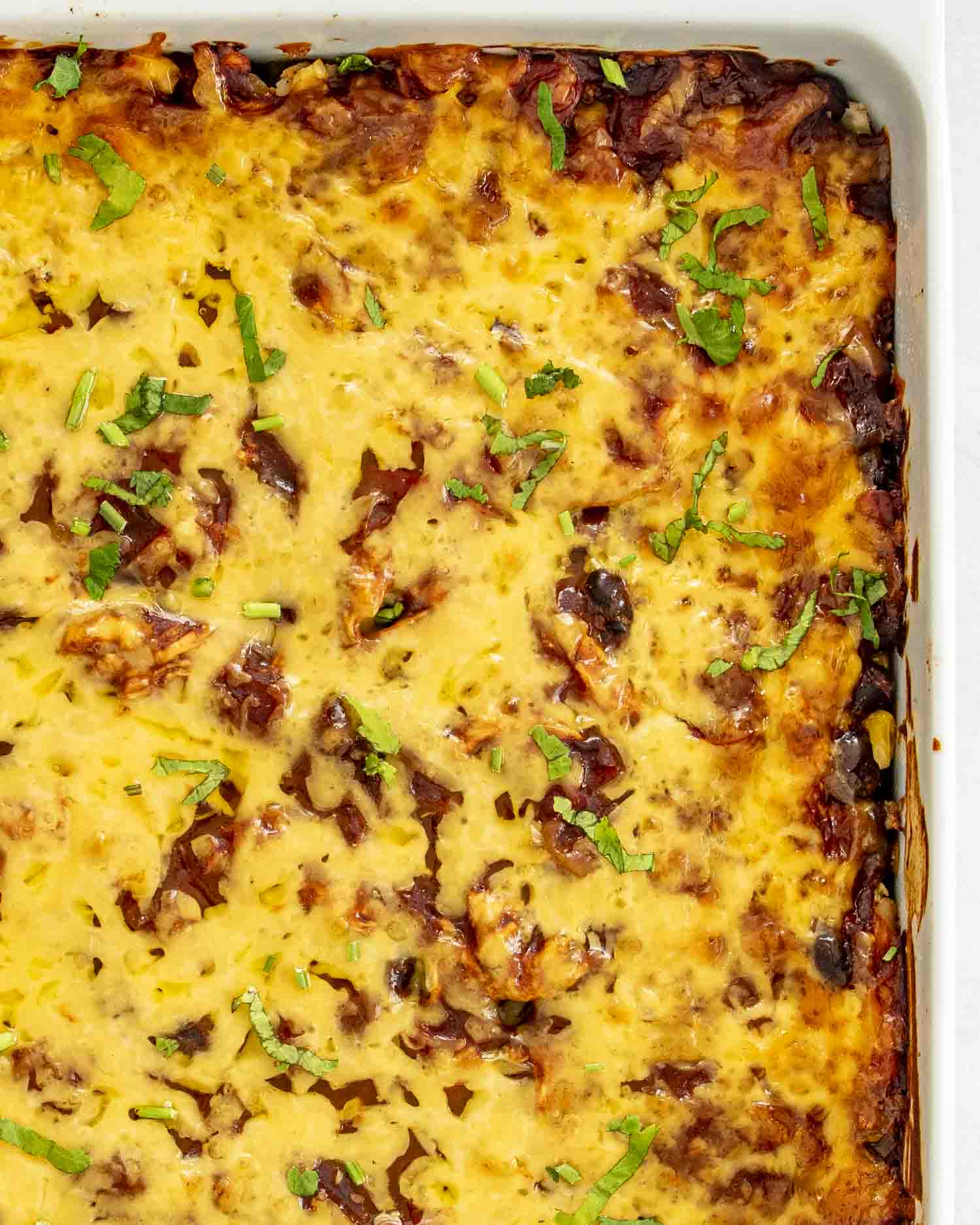 chicken enchilada casserole in a casserole dish.