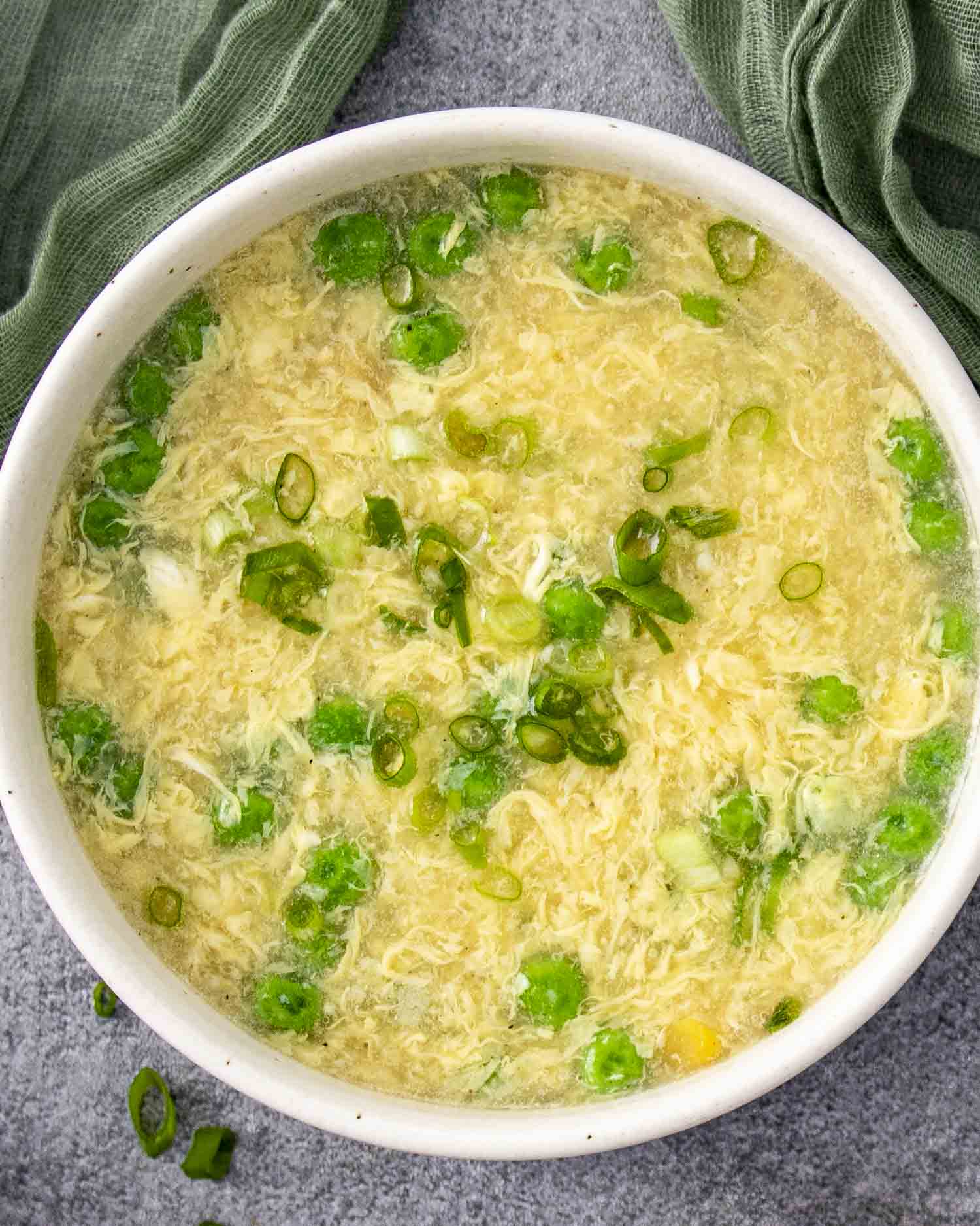 a bowl of freshly made egg drop soup.