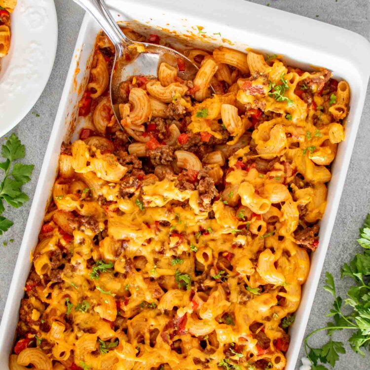 goulash casserole in a white casserole dish.