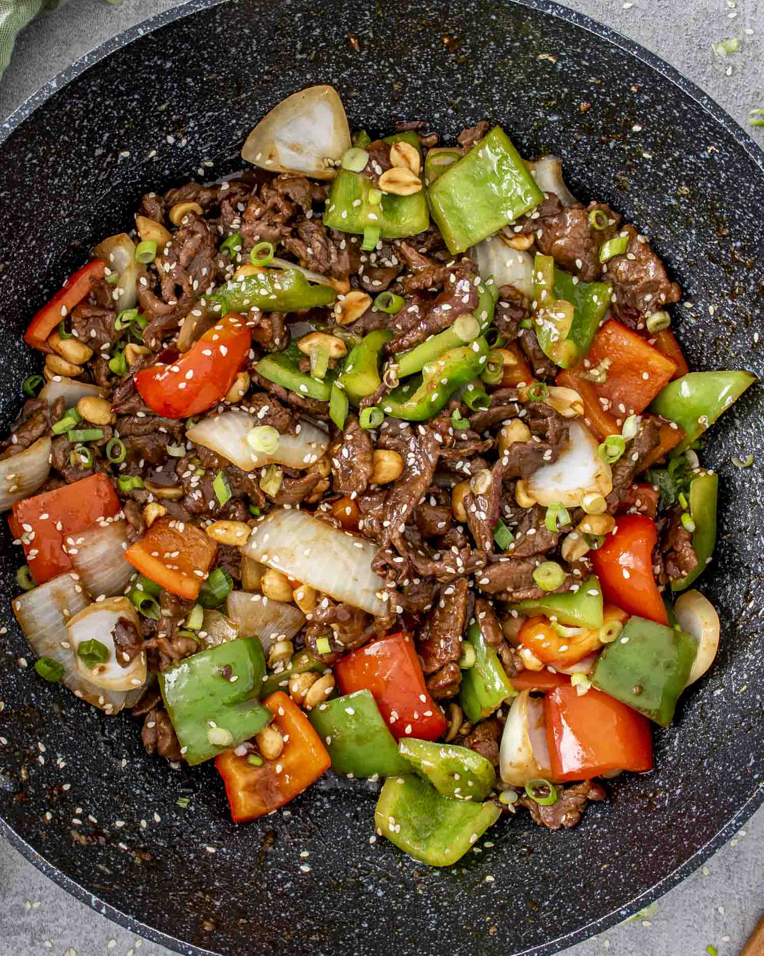 Szechuan beef in a wok. 