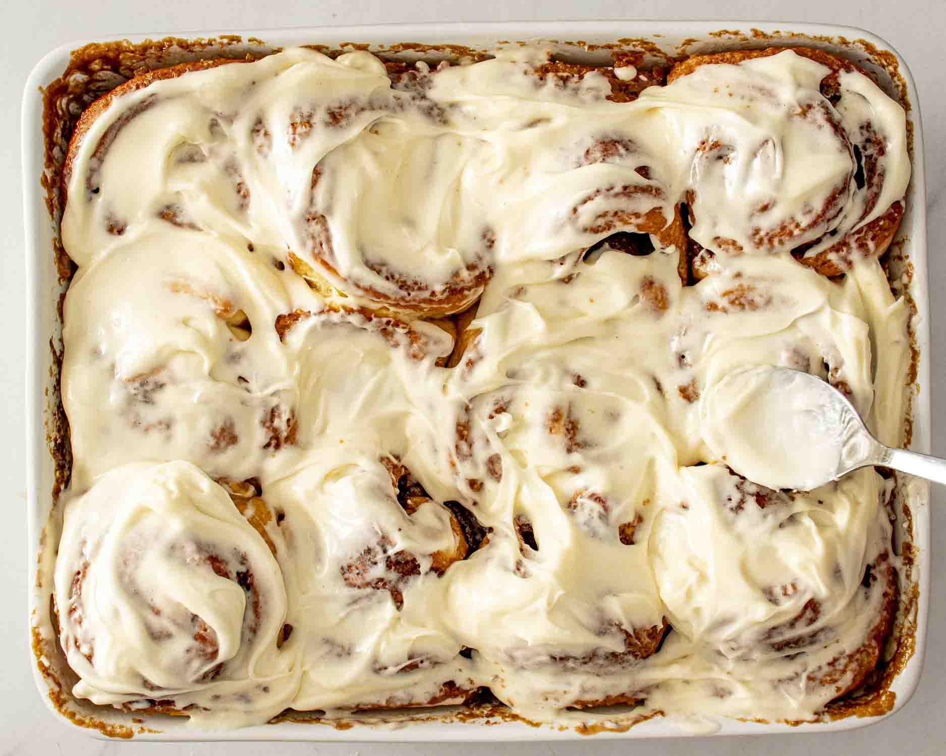 process shots showing how to make cinnamon rolls.