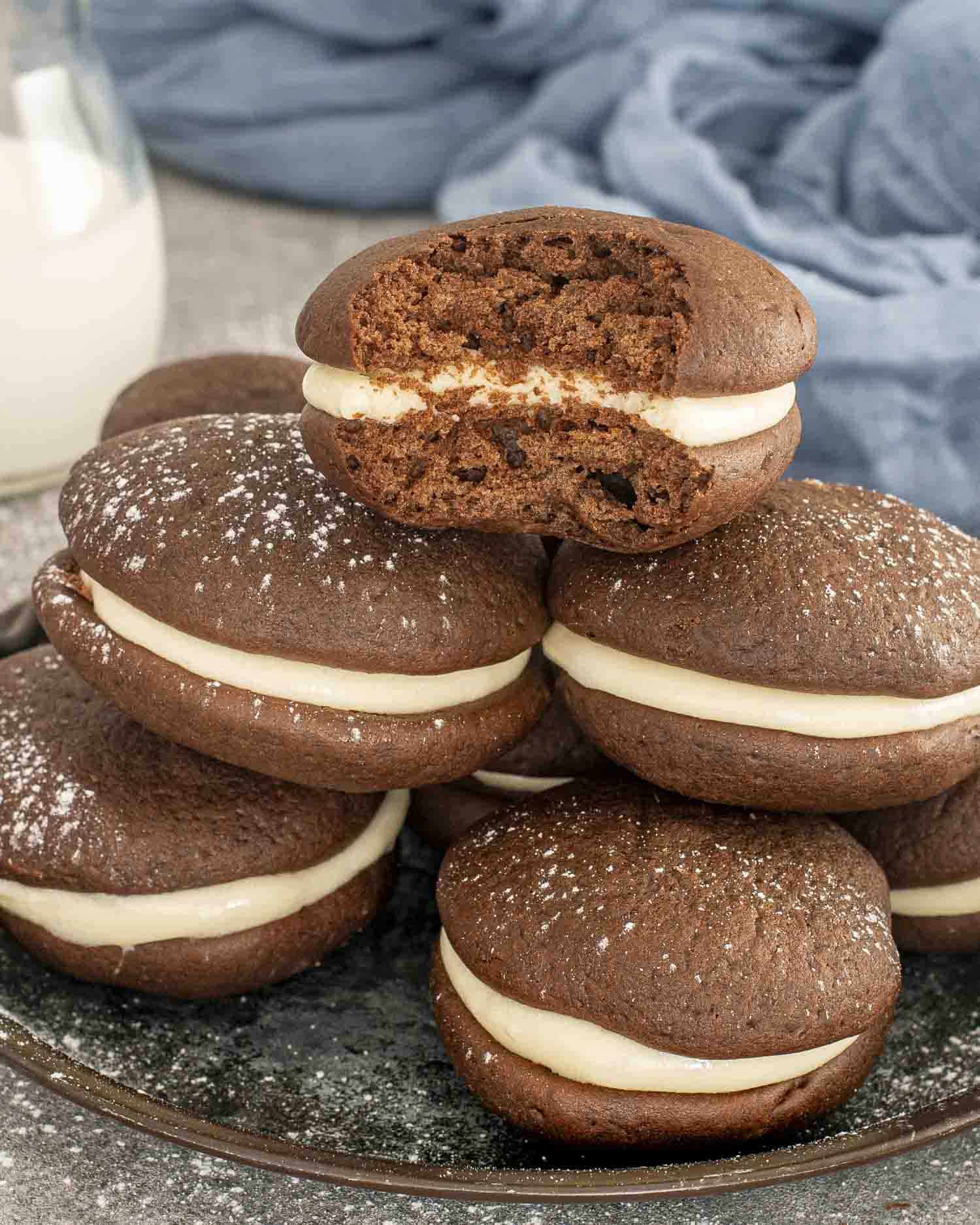 a few stacked whoopie pies on a plate.