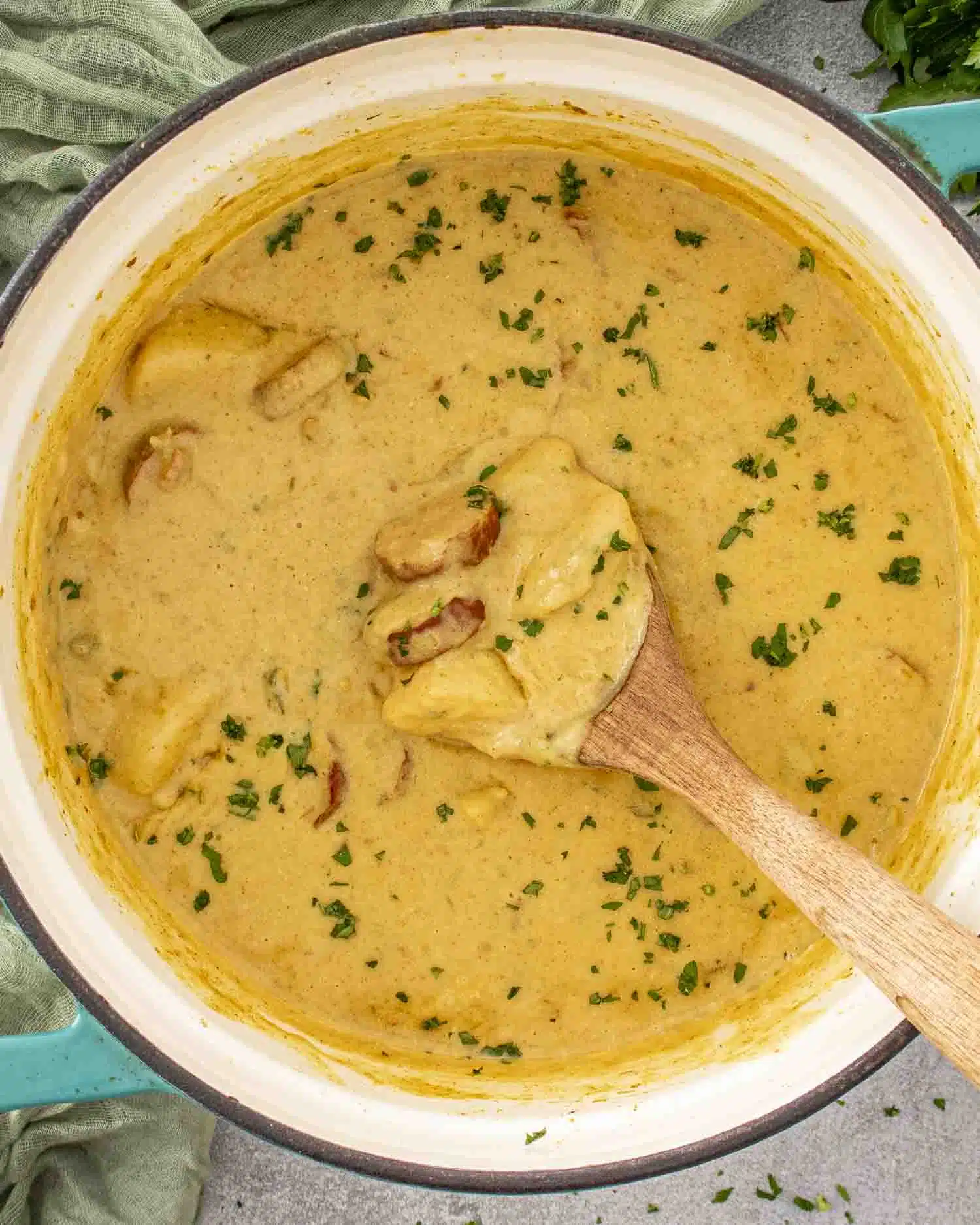 cajun potato soup in a dutch oven.