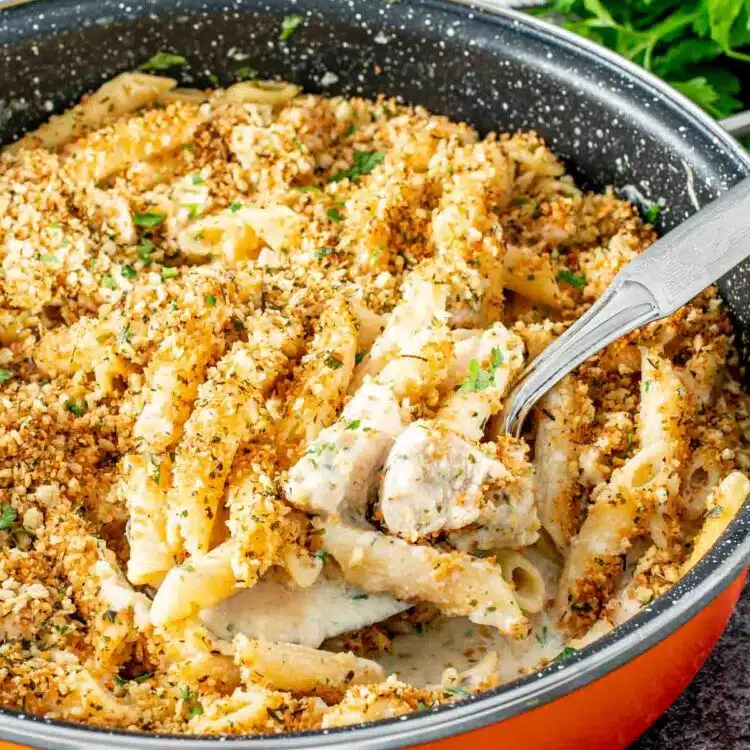 freshly made chicken kiev pasta in a skillet.