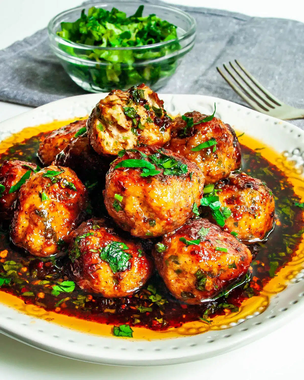 Firecracker Chicken Meatballs smothered in firecracker sauce