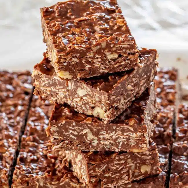 a stack of no bake peanut butter chocolate bars.
