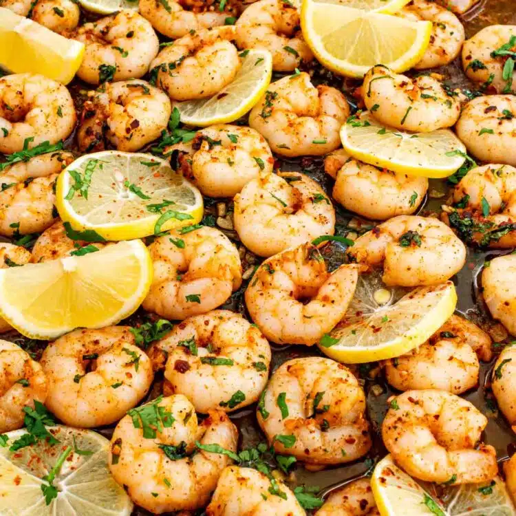 garlic butter shrimp cooked on a sheet pan.