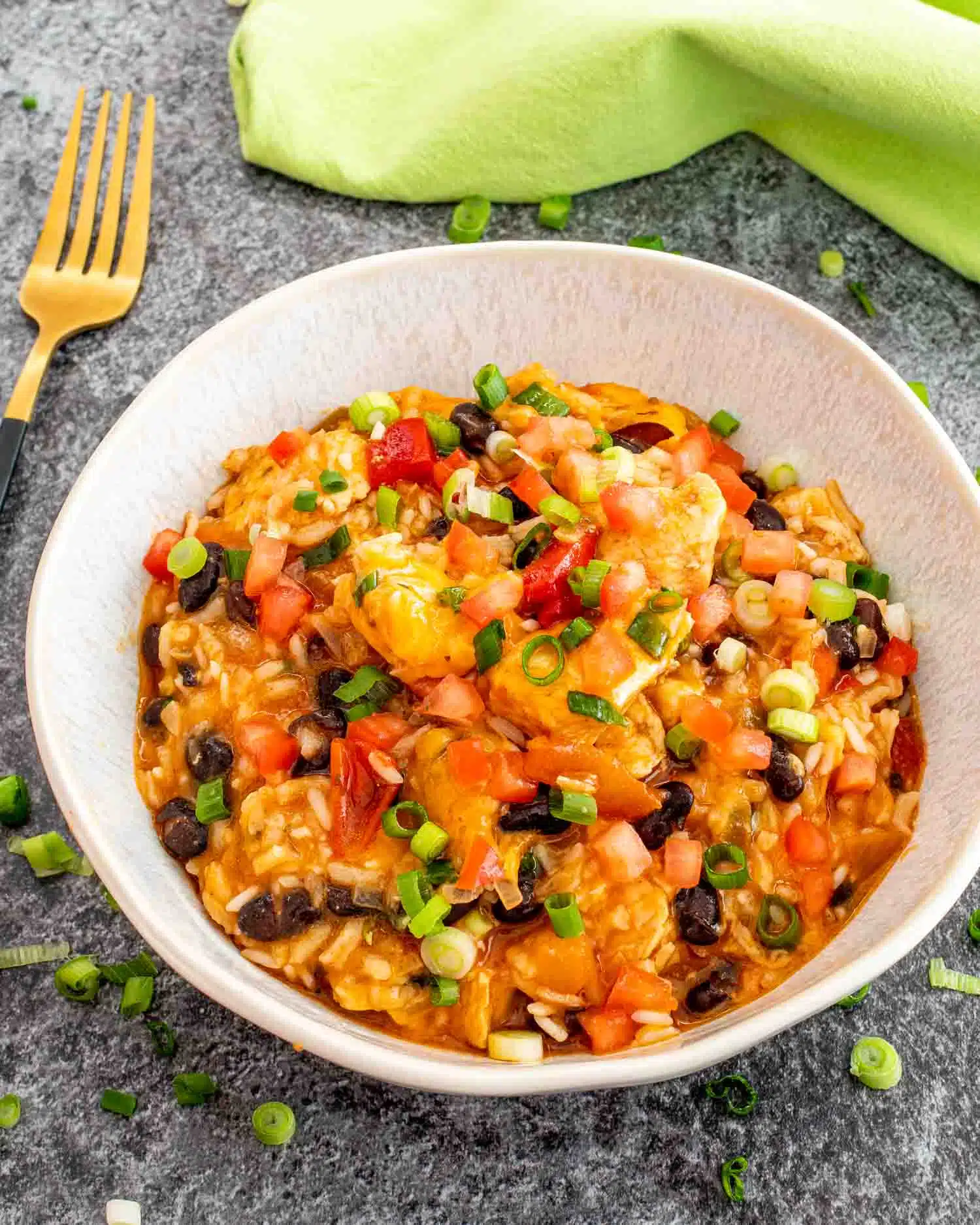 southwest chicken and rice on a white plate.