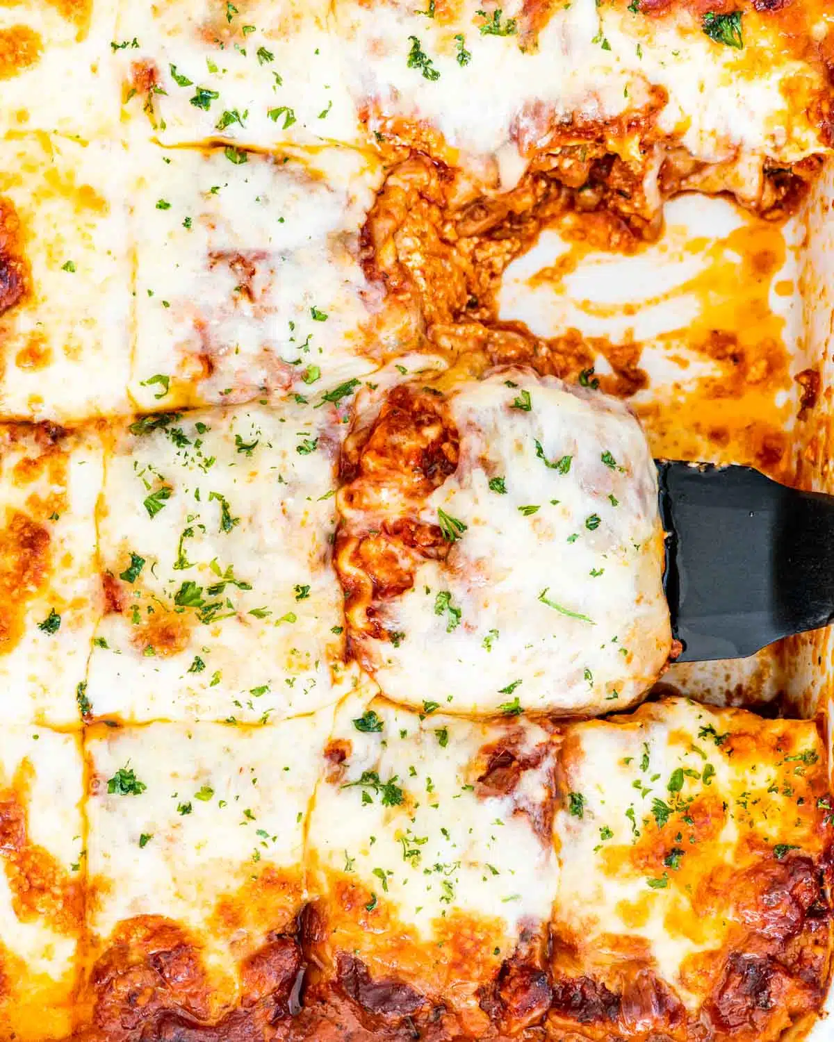 freshly baked lasagna in a casserole dish.